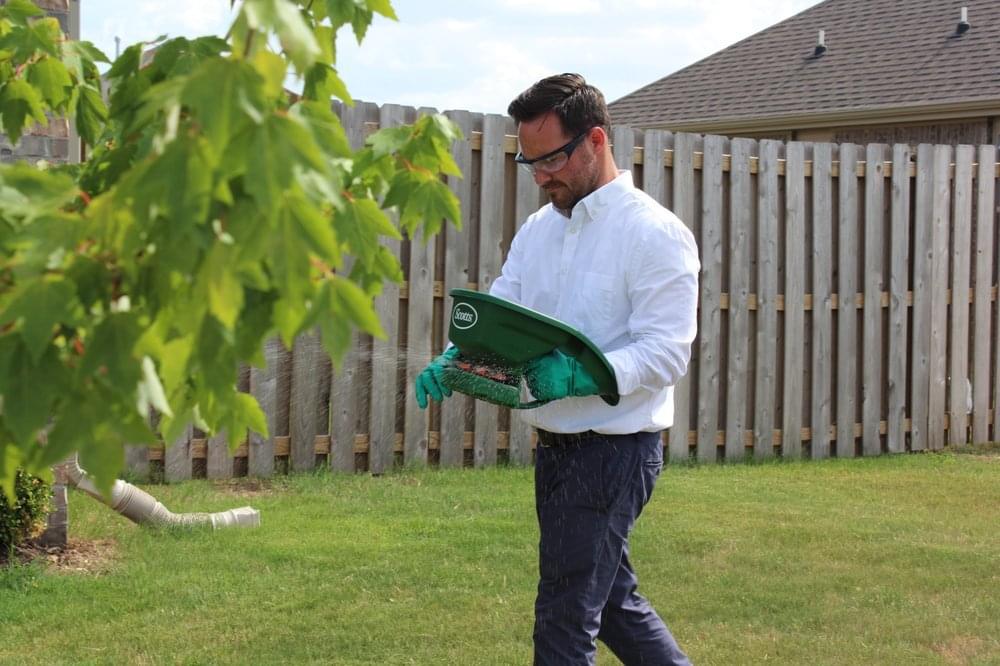 Alder Pest Control servicing a pest control customer in Bentonville, Arkansas